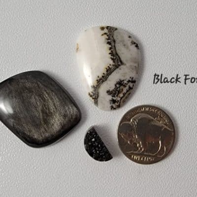 mahogany obsidian cabochon, silver lace onyx cabochon and black druzy.