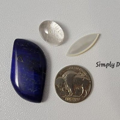 high-grade Afghan lapis, mother-of-pearl rutilated quartz cabochons.