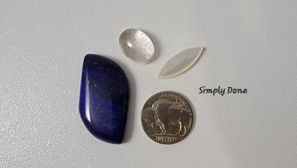 high-grade Afghan lapis, mother-of-pearl rutilated quartz cabochons.