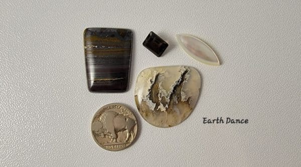 tiger iron cabochon, mother-of-pearl cabochon, smoky topaz faceted stone, agate cabochon.